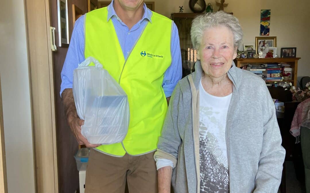 Angus Taylor meets client Joan on meal delivery