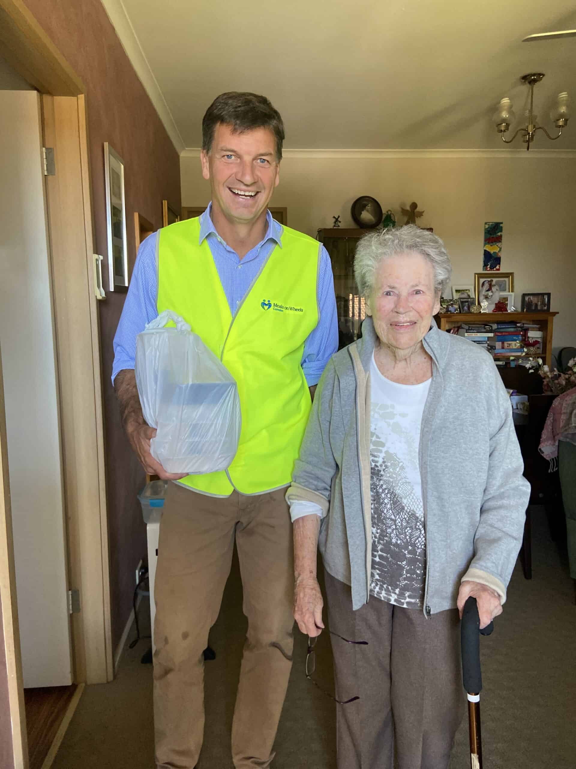 Angus Taylor meets client Joan on meal delivery